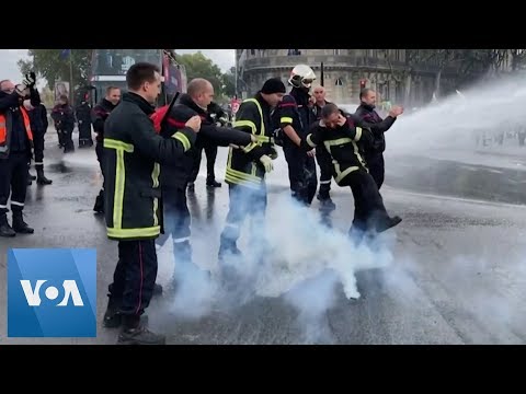 5000 French firefighters marched the streets of Paris protesting for ...