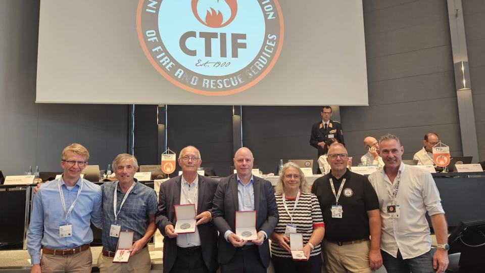 The following people received medals from CTIF: Pierre Castaing,  (left in the photo) former Euro NCAP President, Michel van Ratingen, (middle) Euro Ncap General Secretary, were awarded the Grand Medal of Honour from CTIF. Celine Adalian, Euro NCAP Inspector / Chair woman of ISO 17840 group received The Medal of Honour  from CTIF. Also awarded a Medal of Honour (but not present at DA) was Simon Edmonds, Euro NCAP inspector and secretary of the post-crash group. 