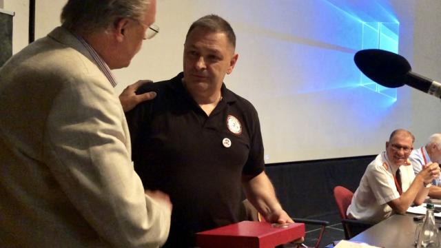 Michel Bour recieves the Honorary Member Award form CTIF President Tore Eriksson after completing his full two (8 years) terms as General Secretary. 