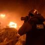 https://commons.wikimedia.org/wiki/File:Journalist_documenting_events_at_the_Independence_square._Clashes_in_Ukraine,_Kyiv._Events_of_February_18,_2014..jpg