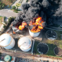 Wikipedia Creative Commons License  Description: A fuel storage tank fire in Columbia  Date: December 22, 2022  Source: elcolombiano.com/colombia/incendio-en-barranquilla-controlan-llamas-en-un-tanques-de-combustible-que-causo-emergencia-HG19686010  Author: Unknown